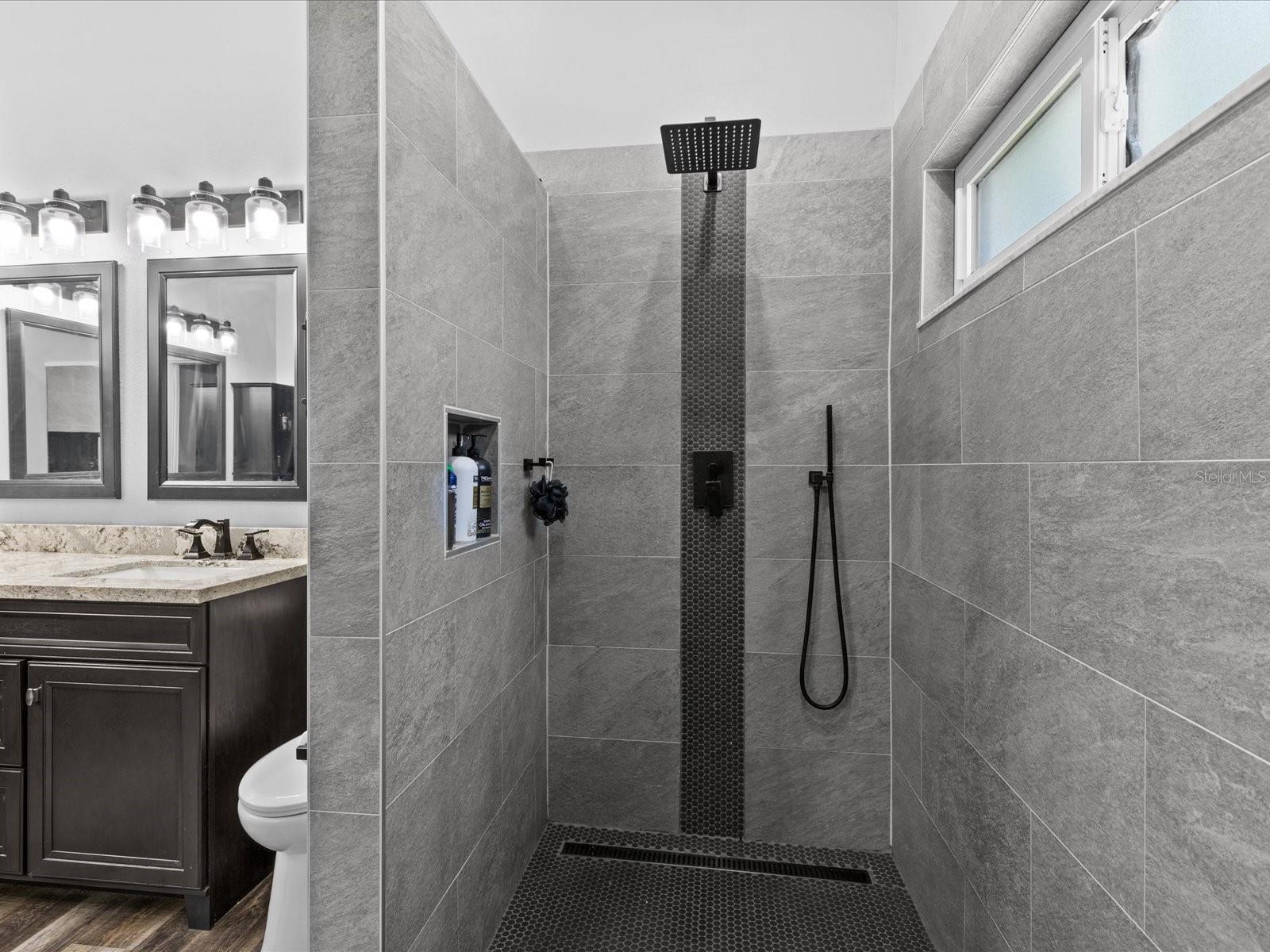 two shower heads, one on each side