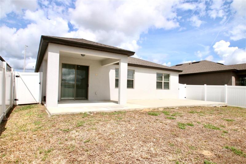Fenced in Backyard with Patio