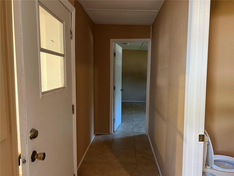This is the hall that leads to the master bath to the right and the master bedroom at the end of the hallway.