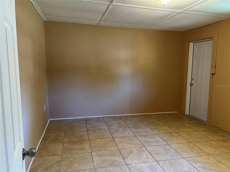 Master bedroom as you enter.