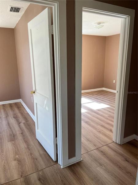 Hallway leading to bedroom #2 and #3.