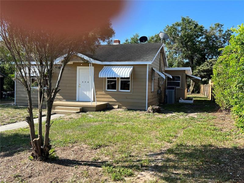 Another view of home and yard.
