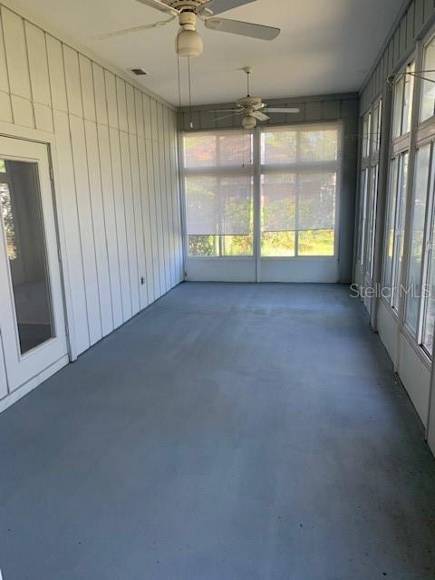 Large porch that has doggie doors