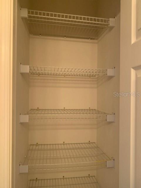 Linen closet behind the door of the 2nd bathroom