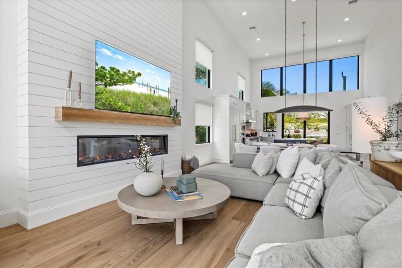 Living room with cozy fireplace feature.