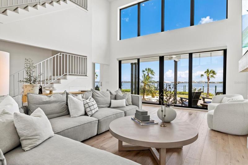 Living room with views of the river. Clerestory windows provide additional natural light.