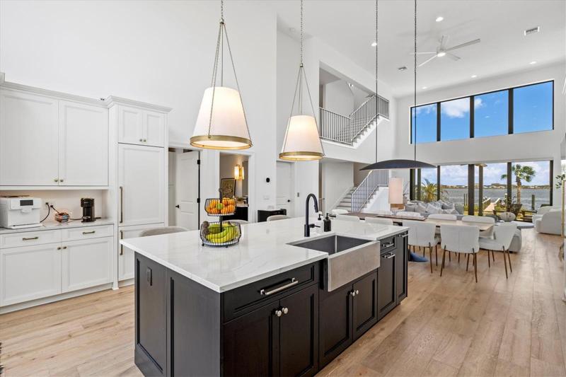 Kitchen features high end Wolf & Liebherr appliances, quartz countertops.