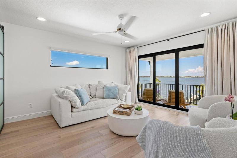 Primary suite sitting room with views of the river.