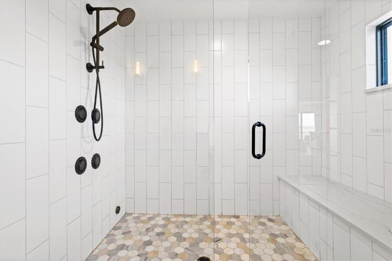 Master suite bath with steam shower.