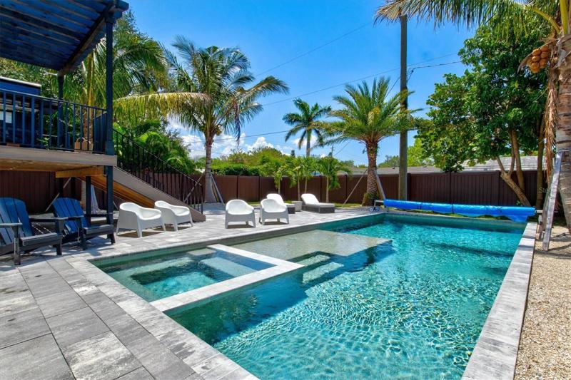 Amazing heated salt-water pool with spa and sun shelf.