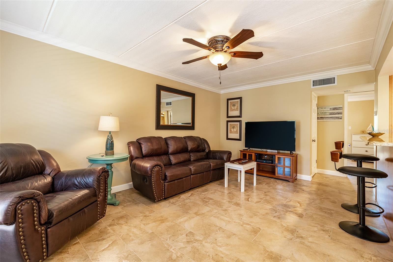 You enter into the open living room