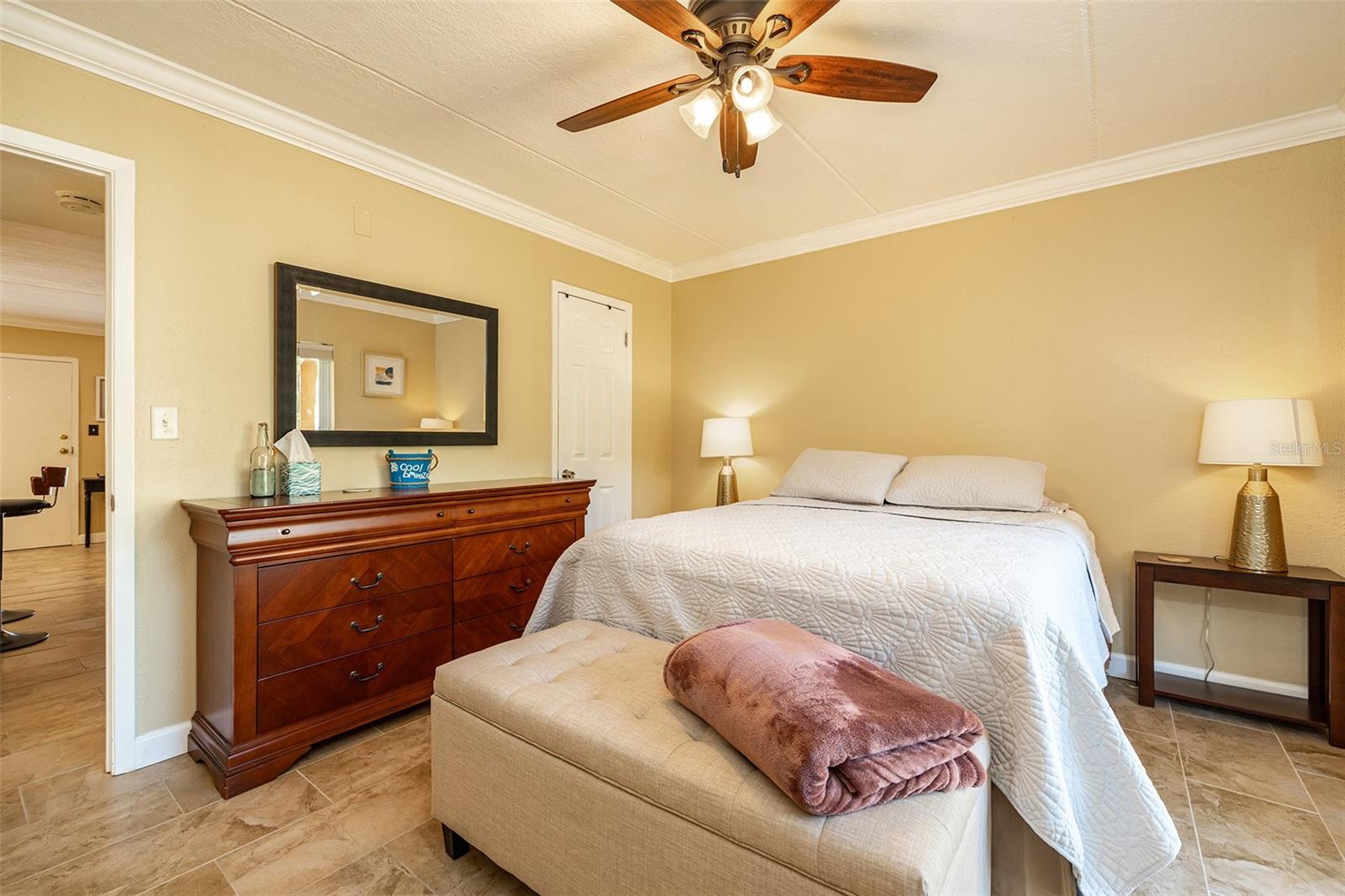 The bedroom is situated at the back of the unit.