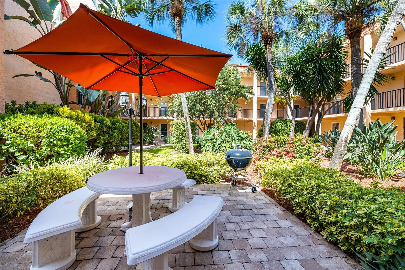 Each courtyard has picnic tables with grills and umbrellas for all to enjoy