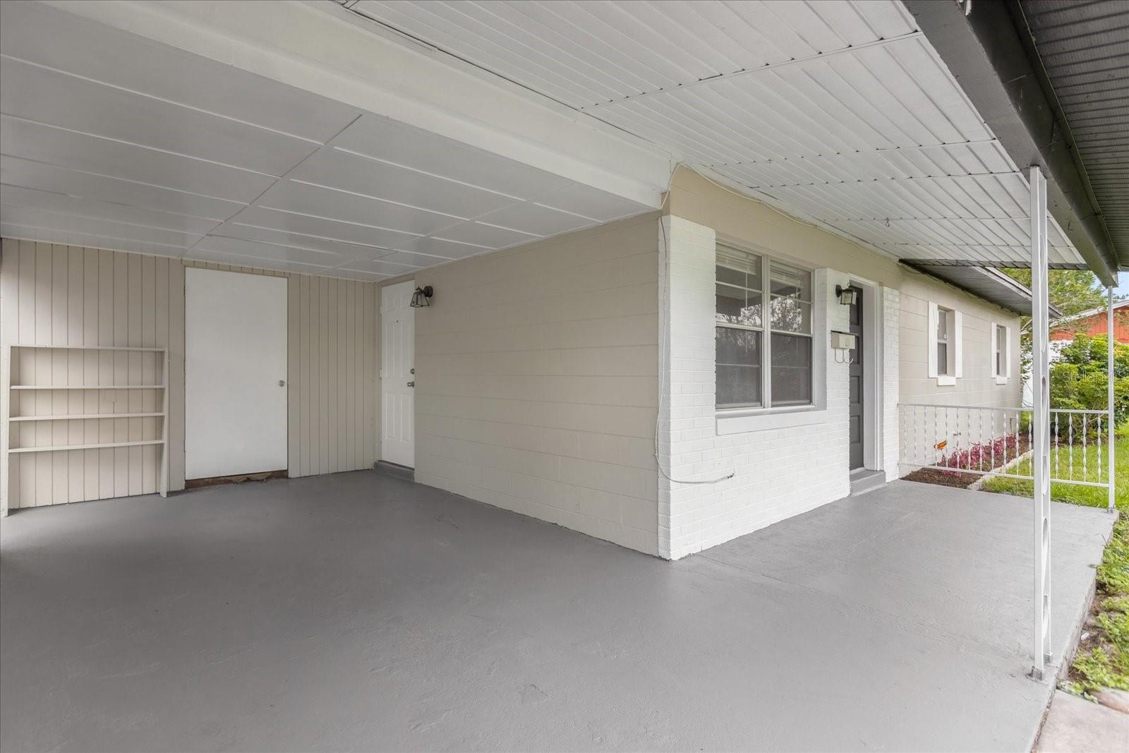 Carport with access to laundry/utility room