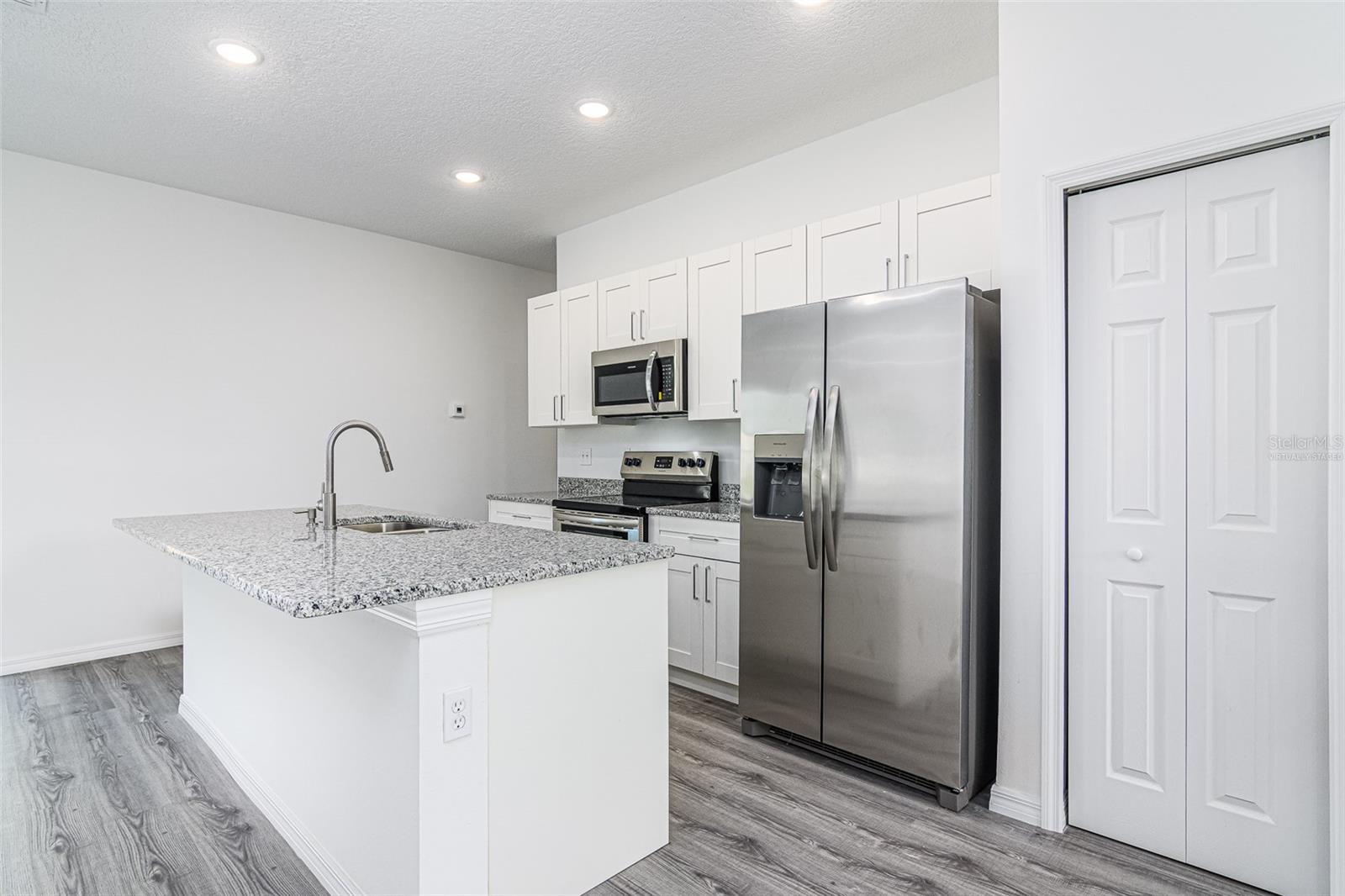 Virtually staged Center island w/sink
