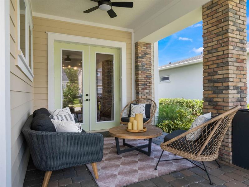 The front porch wraps around to the side and you can enter from the dining room.
