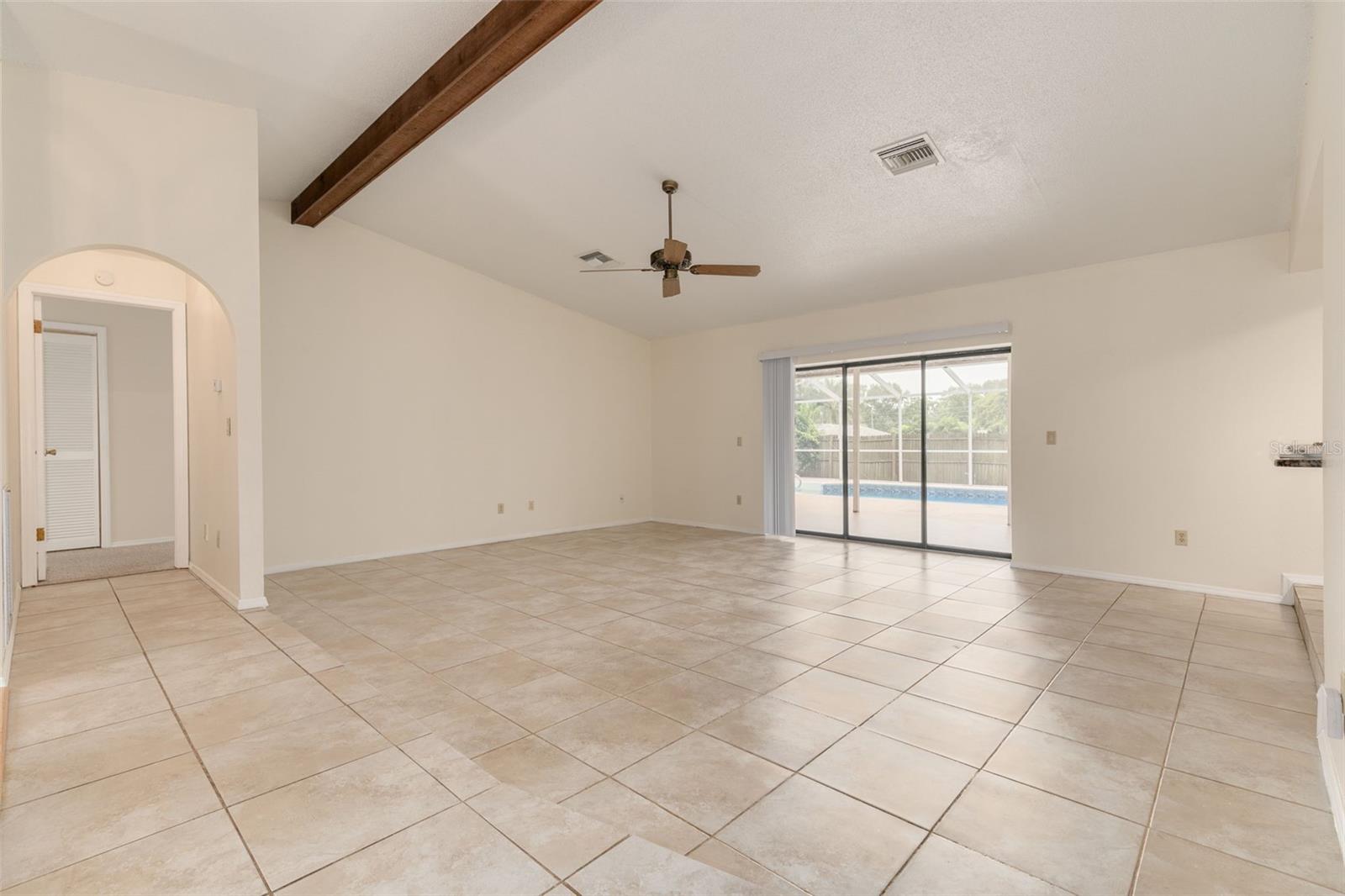 Looking toward owners' suite and sunken living room from dining room