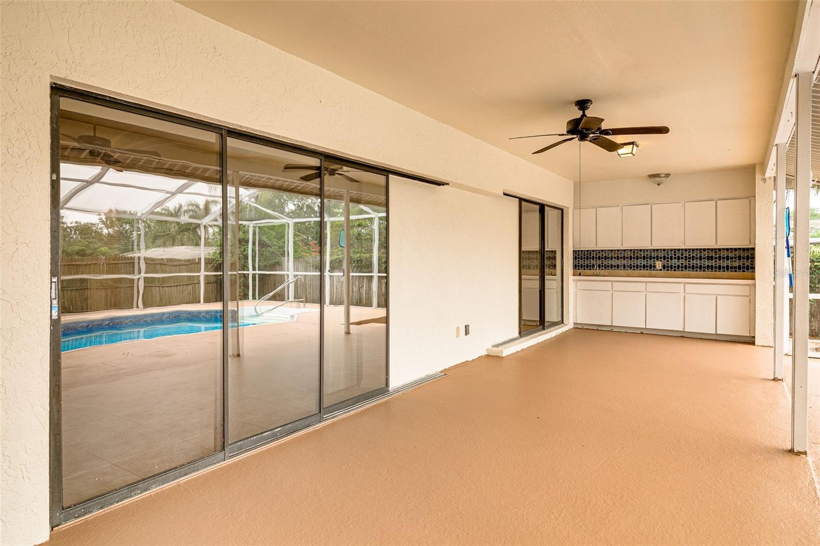 Large covered lanai for weather-proof entertaining!