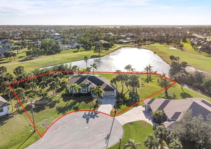Aerial shows extensive property. over 1 acre