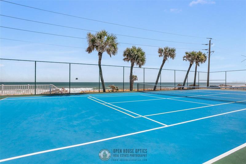 Tennis Anyone? Enjoy a game of tennis with the refreshing air from the  Atlantic ocean in the forefront.