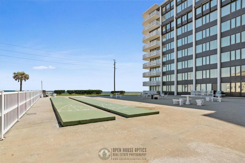 Shuffleboard anyone? Shuffleboard is especially enjoyable while overlooking the Atlantic ocean on this beautiful, pristine community patio.