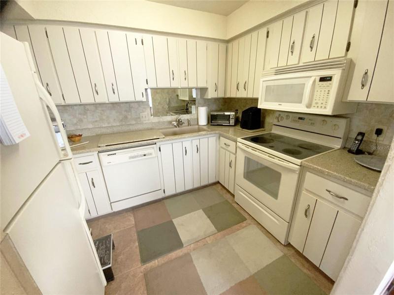 Cabinets galore. A kitchen with more than ample cabinets and storage.