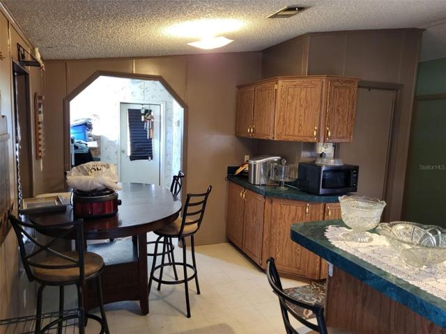 Dining room leads to the other entrance and laundry room