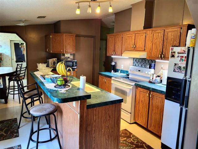 Open kitchen and dining areas