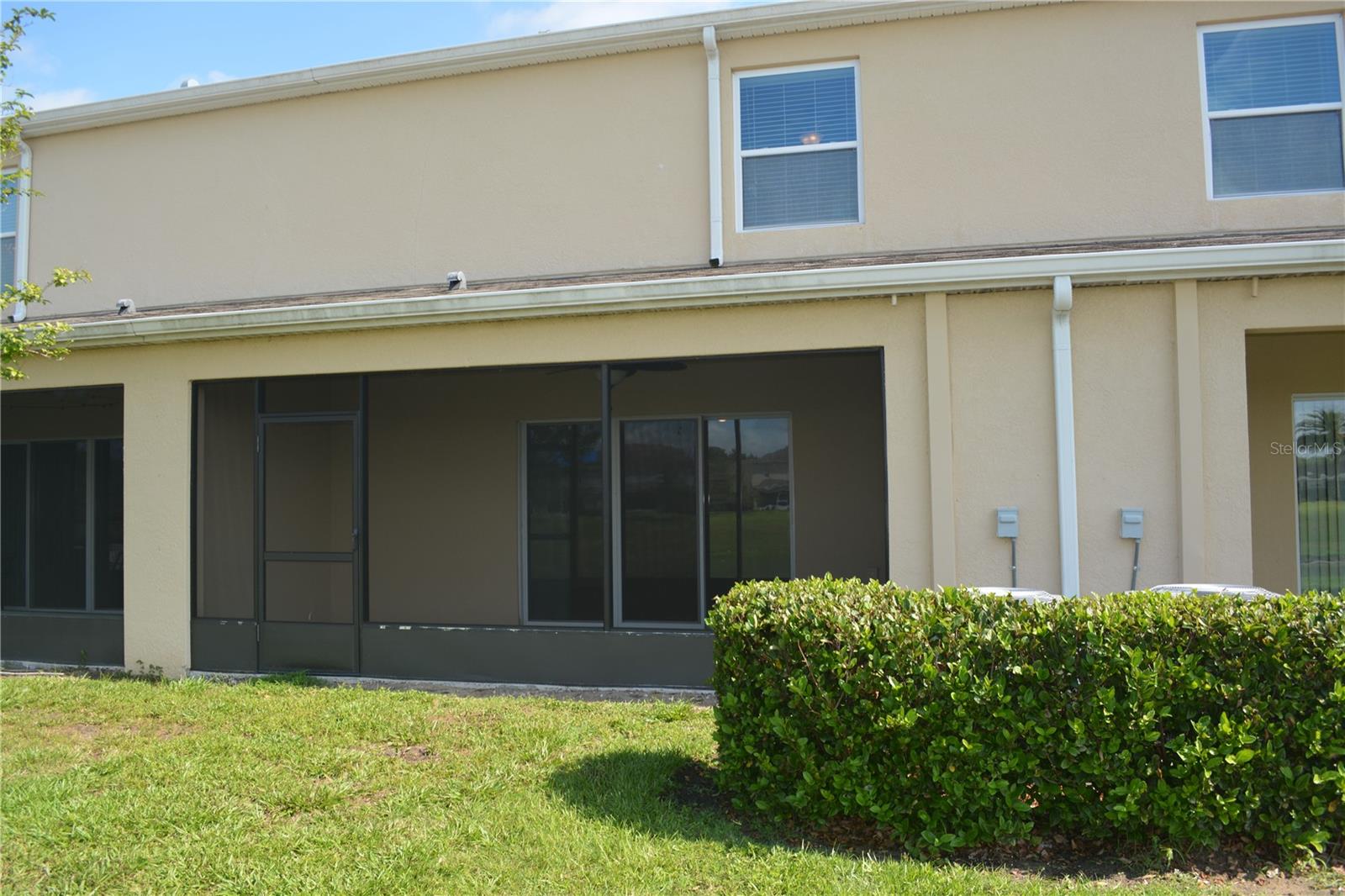 Rear covered/screened patio
