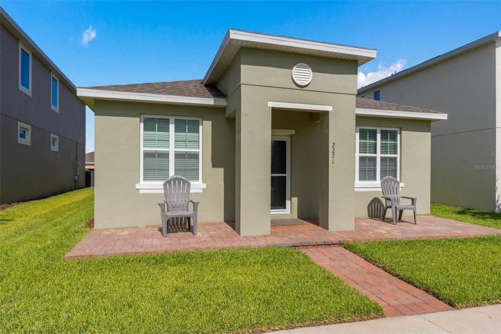 Beautiful ranch with custom paver front patio.