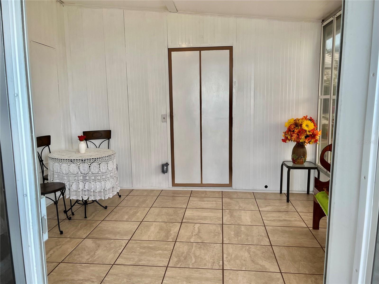 Bonus enclosed porch off the carport