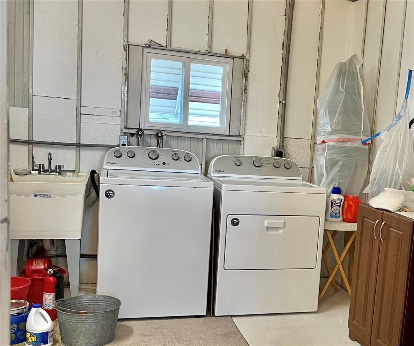 Washer/Dryer &amp; laundry sink in Storage Room