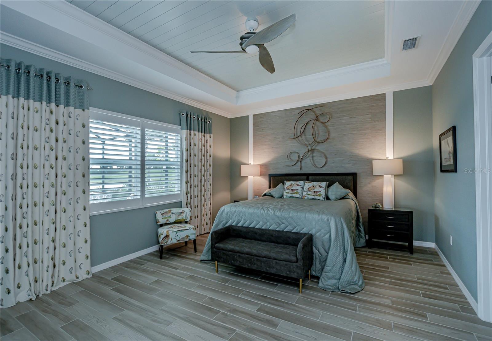 rich master wall accents plus recessed ceiling, views abound