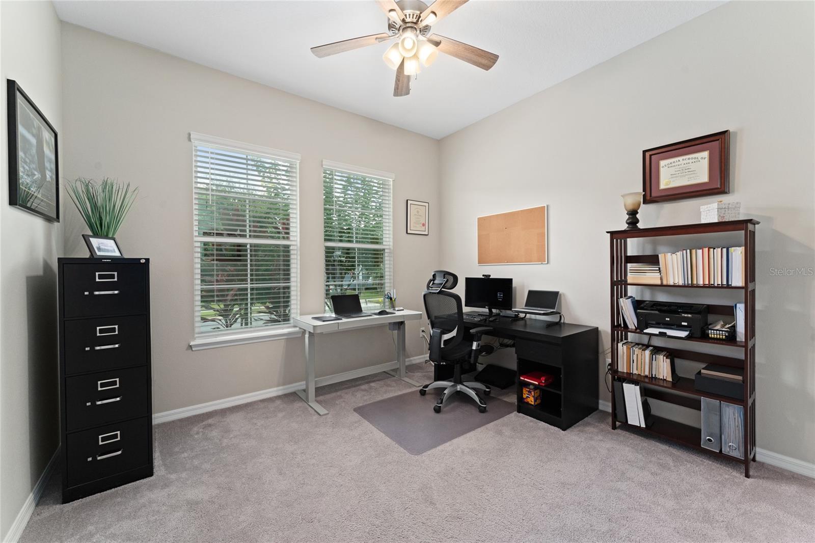 This is the 3rd bedroom, which currently being used as a home office.