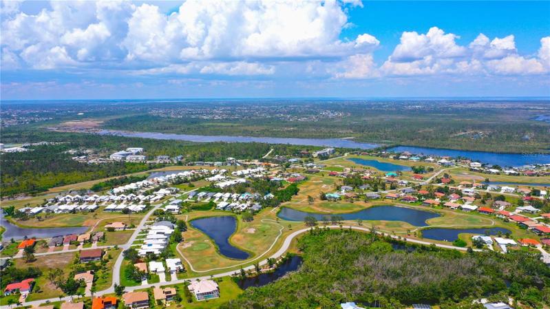 Aerial Photo of surrounding area w/ Golf Courses