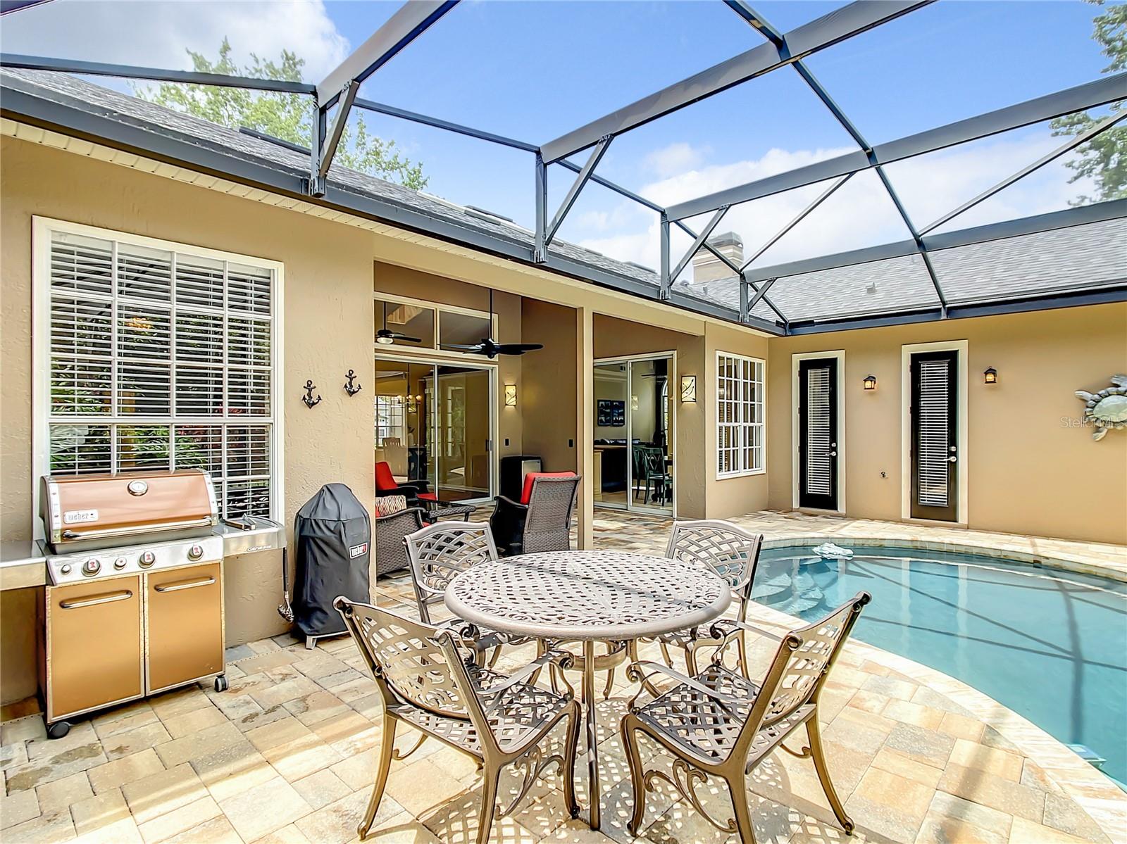 Plenty of room under screened pool.