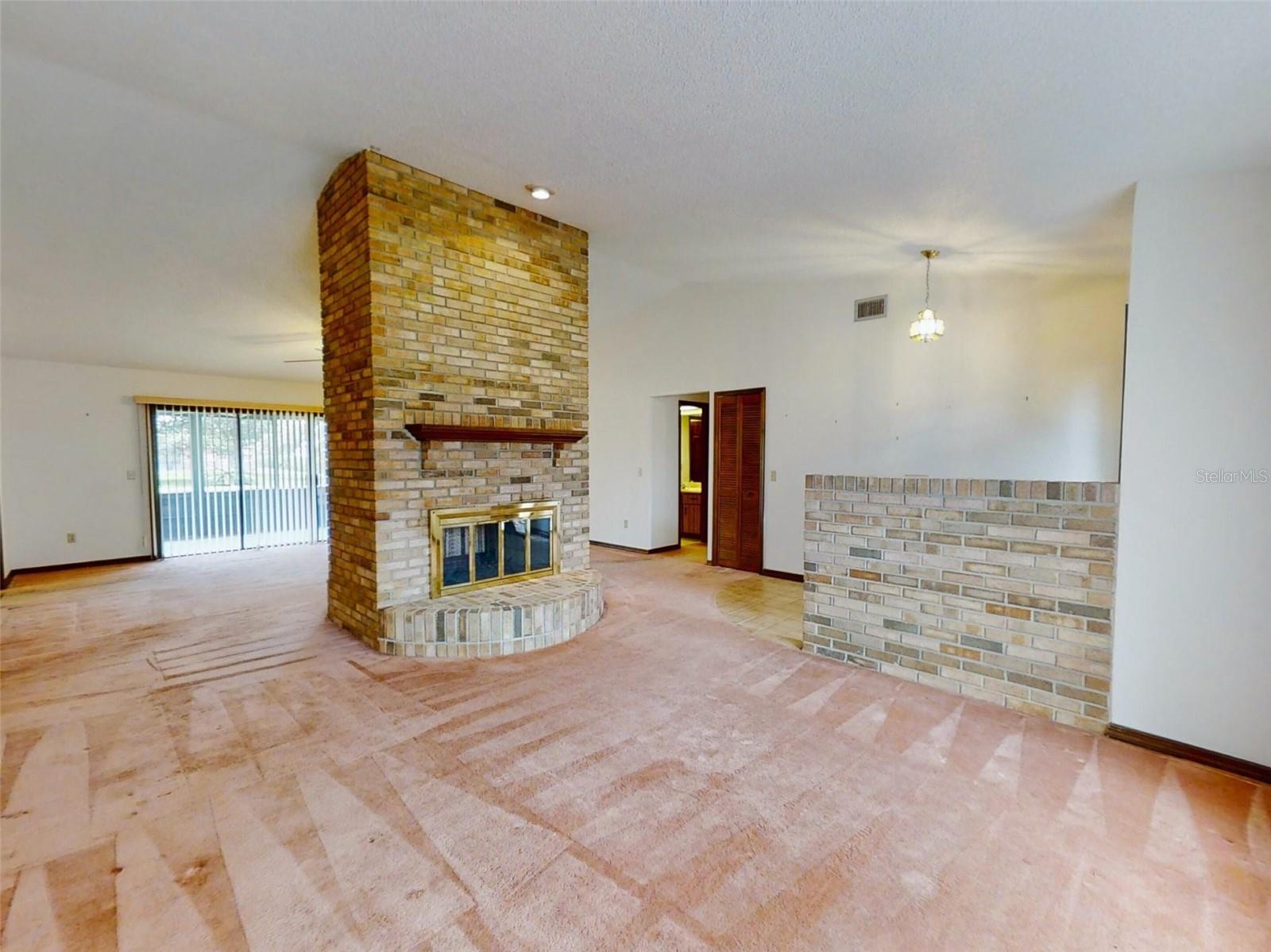 Living room looking toward foyer &amp; family room