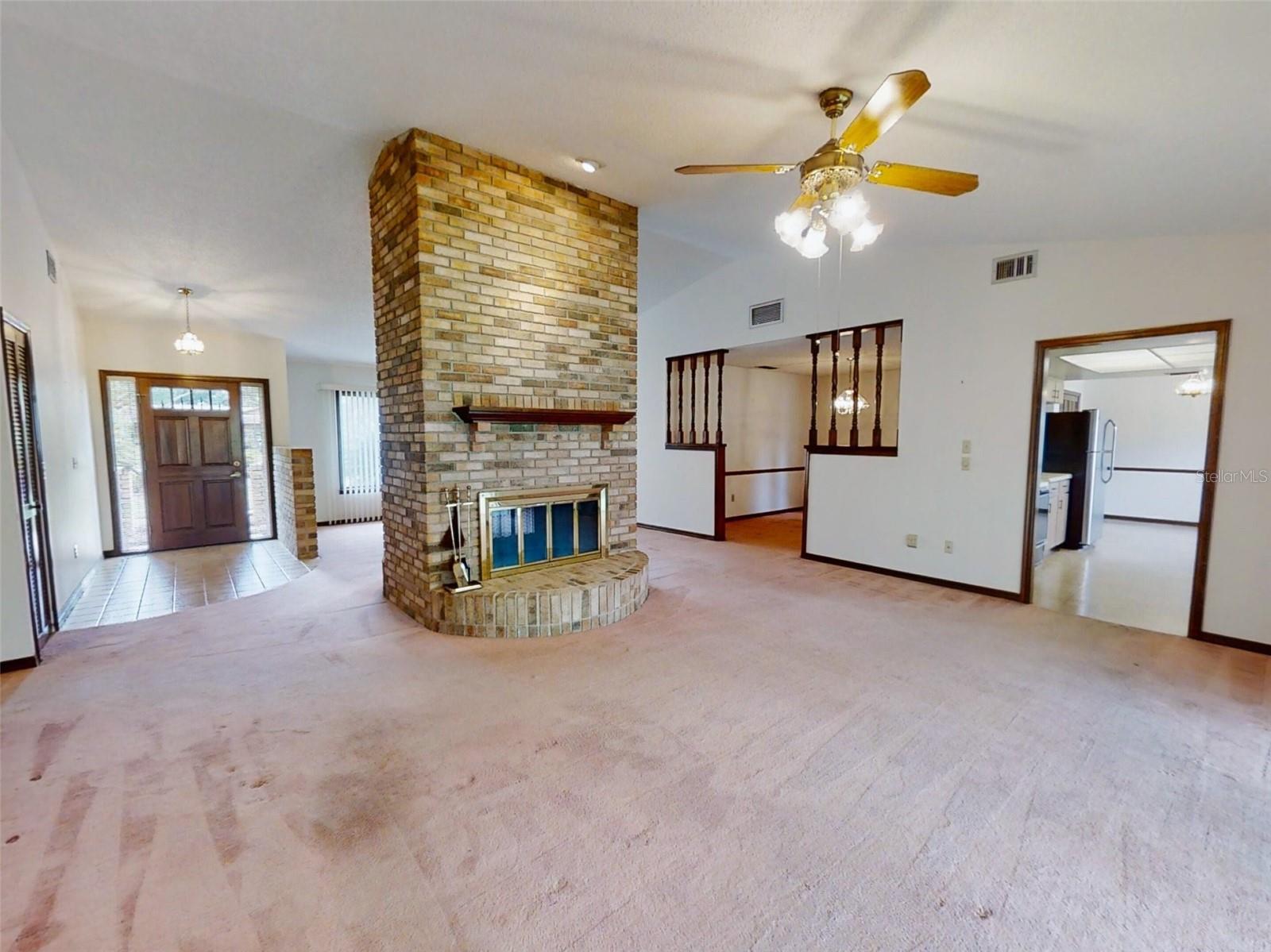 Family room w/entry to kitchen &amp; formal dining room