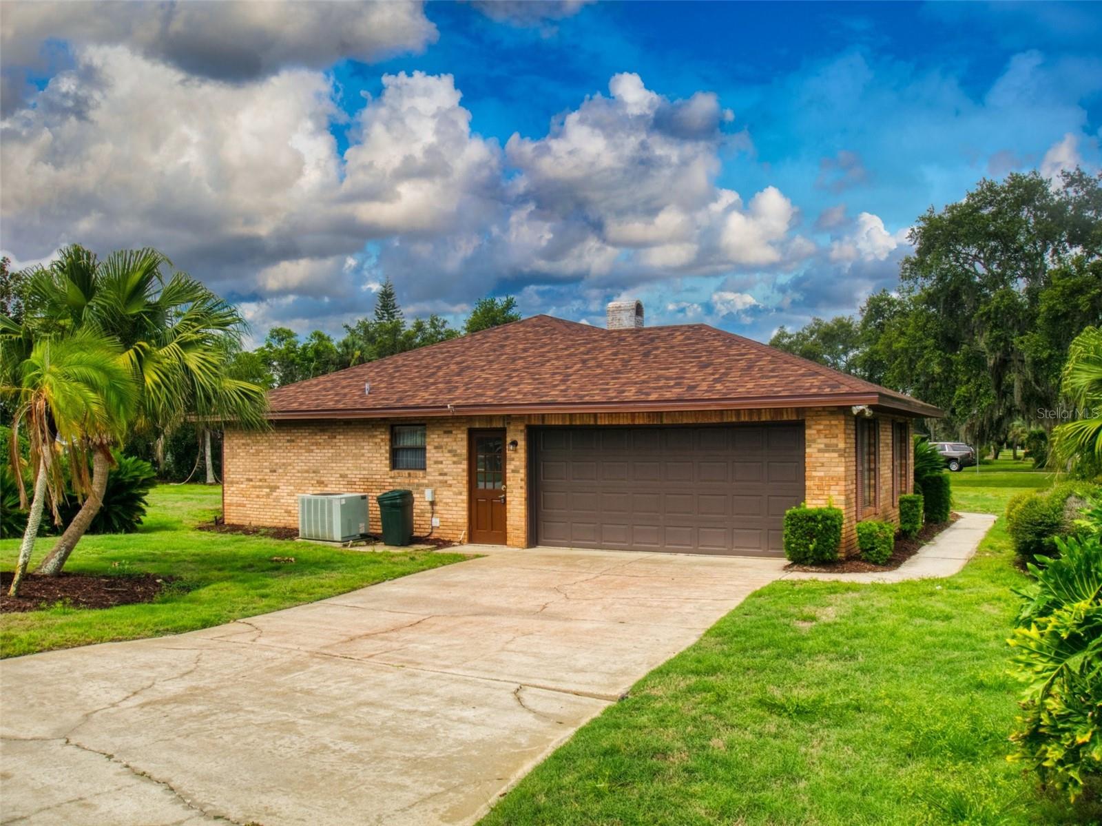 Side elevation w/side entry garage &amp; pedestrian door
