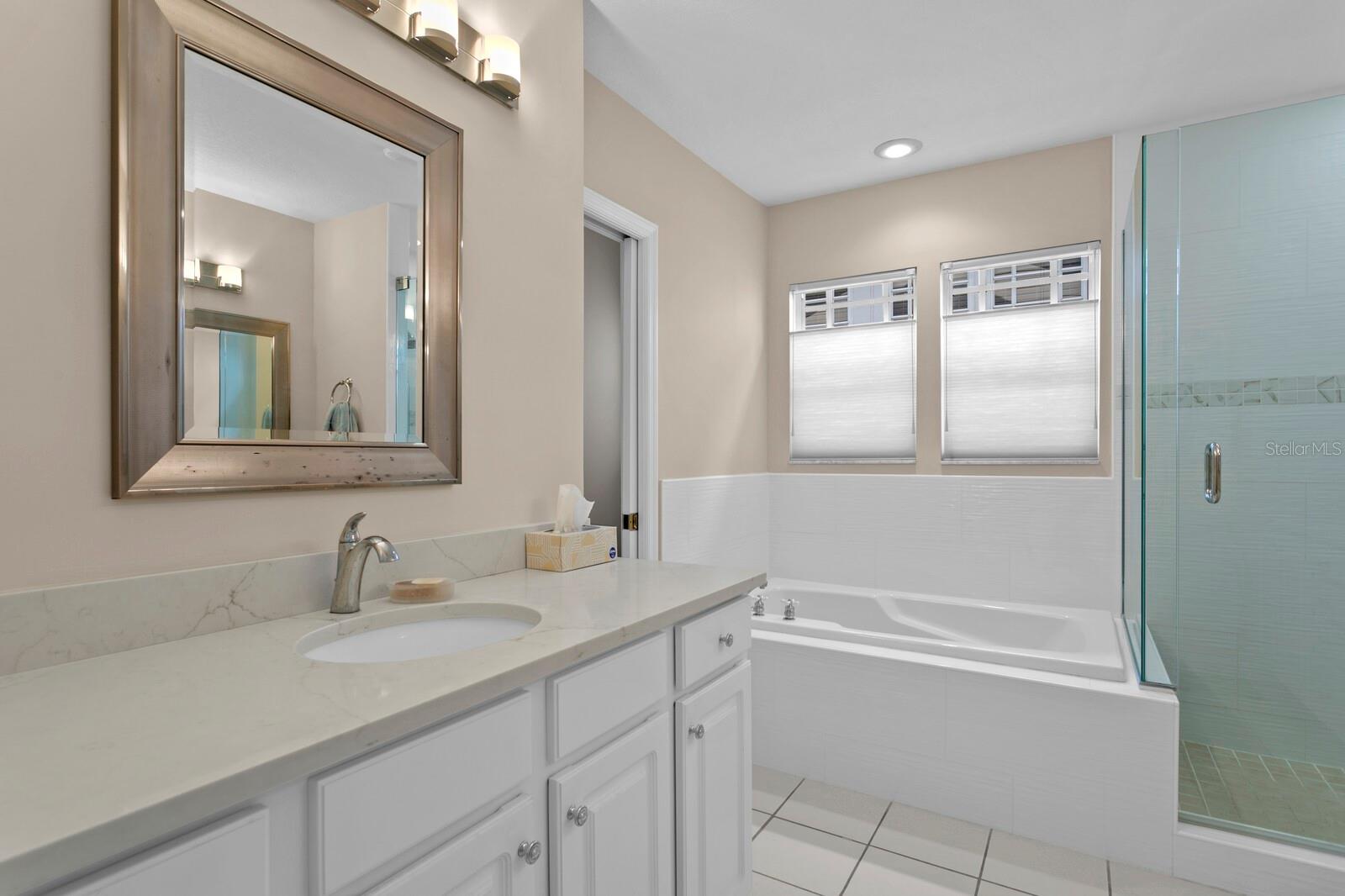 Recently remodeled, there's a soaking tub plus a walk-in shower.