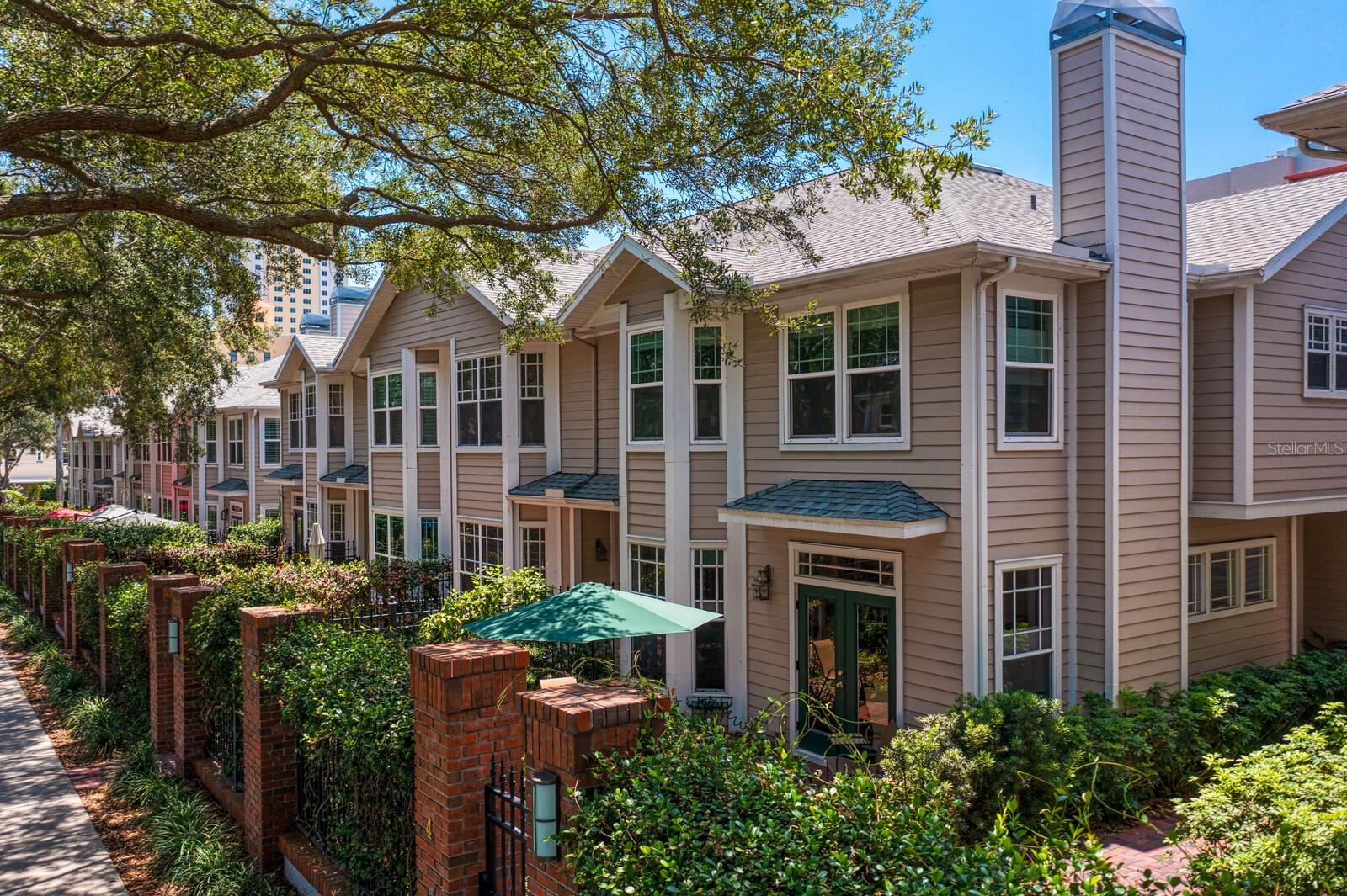 The Huntington Townhomes offer a charming neighborhood within the heart of downtown.