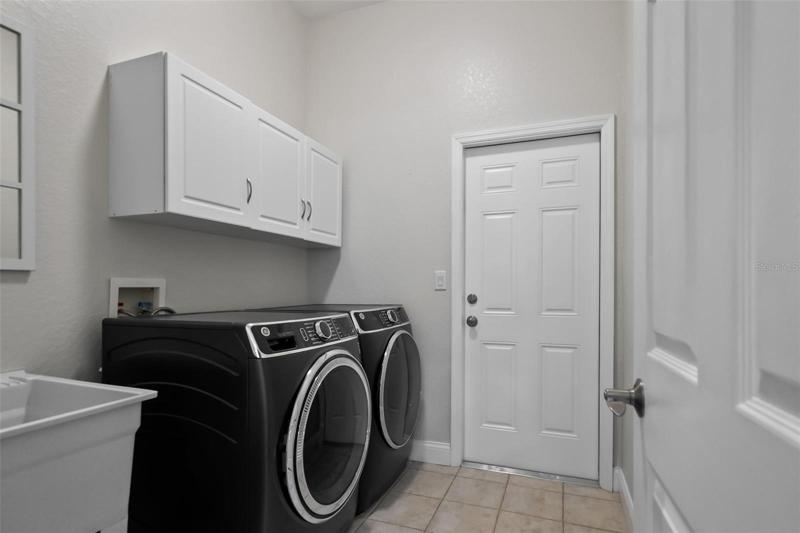 Laundry Room with Cupboards and Utility Sink