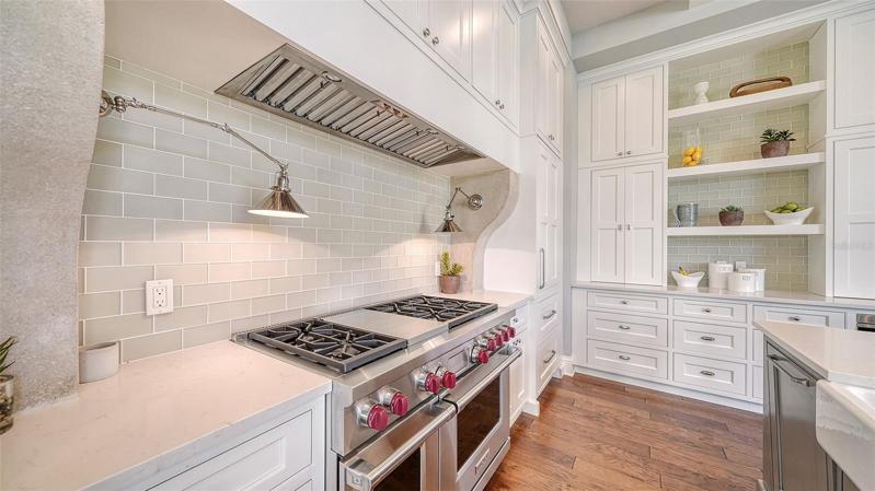 With ample cabinetry, shelving, and walk in pantry (not pictured), you won't run out of storage!