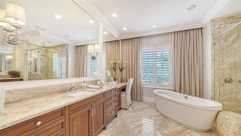 master bathroom with split his/hers vanities