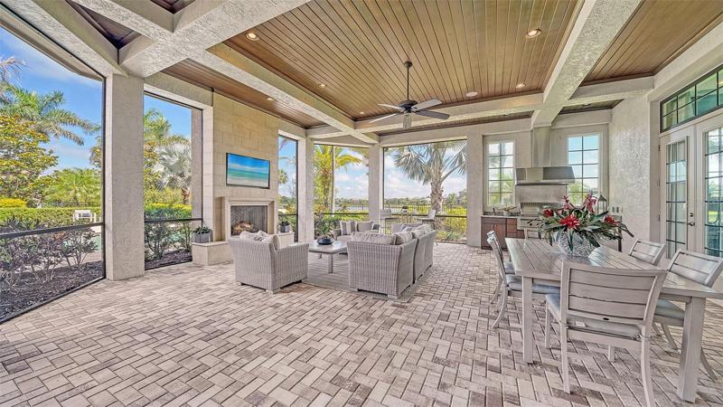 the screened outdoor space is truly like another living room
