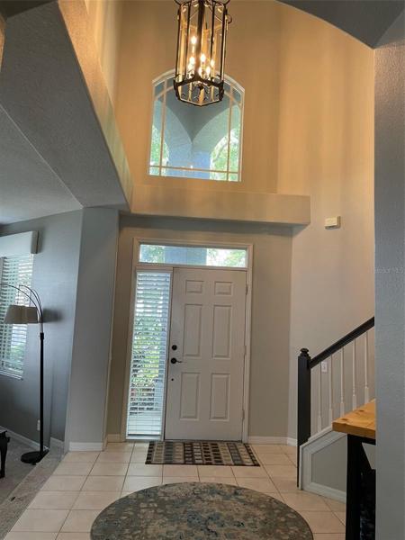 Foyer, stairs and front entrance door