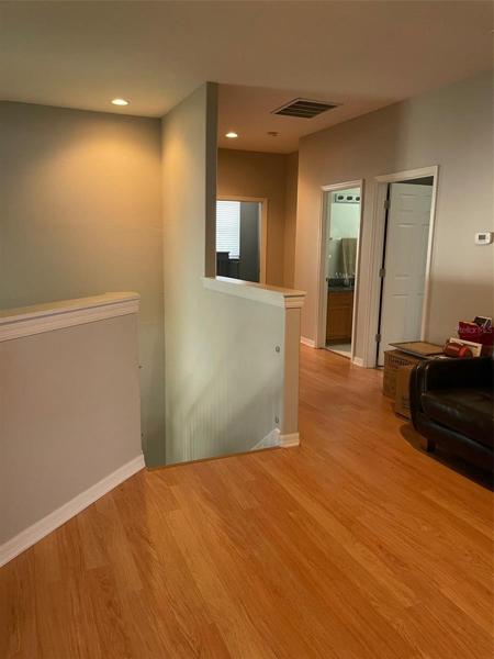 Upstairs Hallway with View to Bedrooms 2, 3, and 4