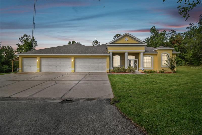 7 acres and FIVE-car garage