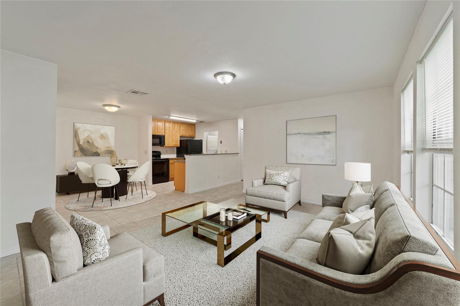 The open concept is highly desired and this condo doesn't disappoint, as the dining area and kitchen are both open to the living room, making it perfect for gathering with family and entertaining friends! Virtually Staged.