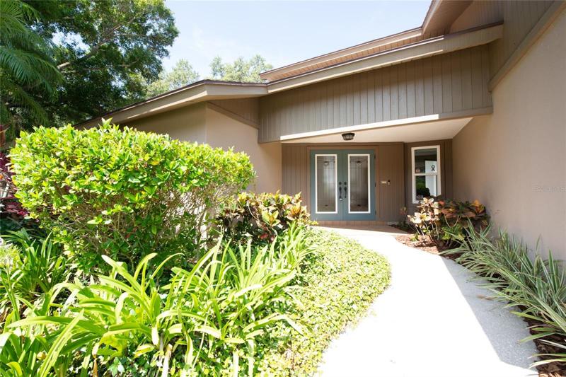 Tranquil Setting Corner Lot, Double door entry awaits a new owner!
